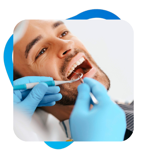A close-up of a cheerful individual smiling brightly, exuding confidence after a successful veneer treatment.