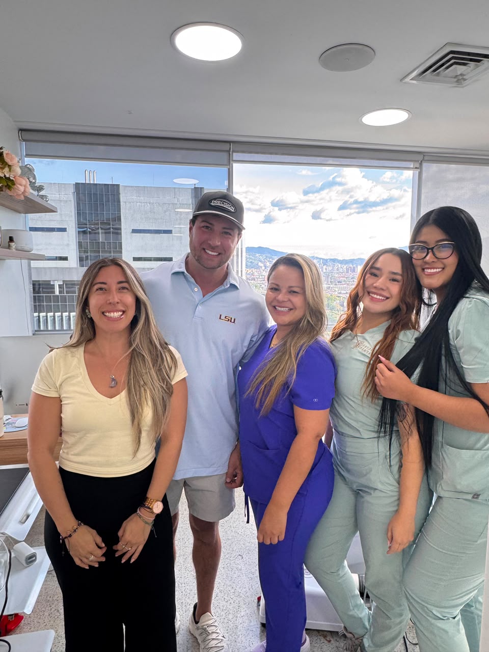Patient smiling after porcelain veneers with Dr. Yazmín Escudero in Medellín, Colombia